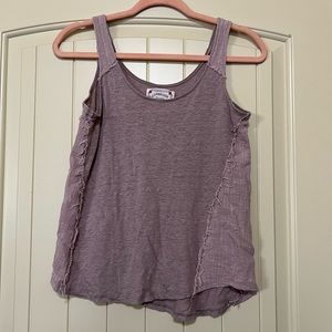 Distressed asymmetrical tank top